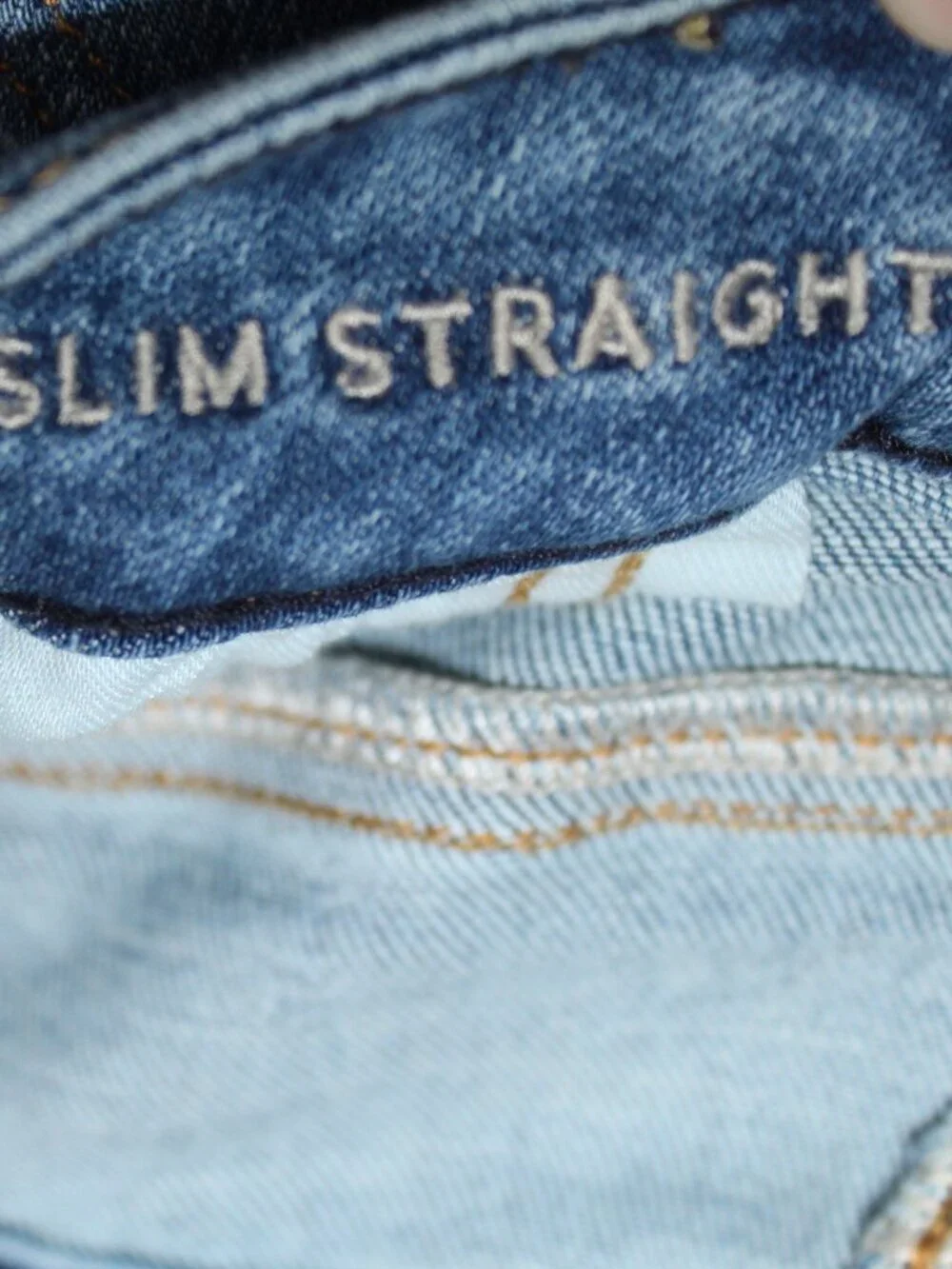 American Eagle slim straight next level stretch medium wash mid rise